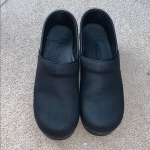 Narrow Dansko Matte Black clogs
